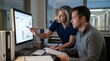 © logonv - Woman doctor and man colleague analyzing clinical data on computer screen. Healthcare professionals reviewing medical statistics in hospital office. Collaborative health research analysis.