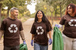 © ADDICTIVE STOCK - Friends volunteering for an eco-friendly cleanup project