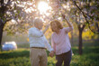 © Halfpoint - Beautiful senior couple in love on date in spring nature.