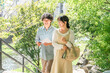 © buritora - Young couples enjoying walking tours and sightseeing in their home country.