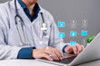 © khunkornStudio - Doctor hands typing laptop electronic medical record EMR healthcare data patient profile digital folder futuristic hospital technology clinic online consultation medical history database system.