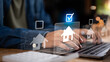 © chaylek - real estate investor compares digital home listings on laptop, reviewing property data, mortgage options, representing smart property selection, fintech housing platforms, modern investment decisions