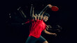© Lustre Art Group  - Table tennis player in extended motion sequence in dark studio with copy space. Concept of wide banner layout, sports advertising template, storytelling motion design and creative campaign visual.
