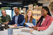 © Rido - Happy multiethnic business people in meeting