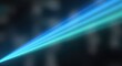 © Zumroatun - A vibrant, glowing blue and teal light beam extends diagonally across a dark, blurred background, creating a dynamic and futuristic abstract visual.