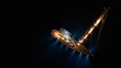 © aerial-drone - Aerial drone night shot of illuminated luxury yacht with wooden deck anchored in open ocean deep blue sea