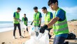 © roky - Young Asian volunteers diligently cleaning up plastic waste from a sandy beach, promoting environmental protection and community service