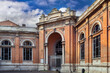 © borisb17 - Facade and entrance gate of Mercato Coperto in Ravenna, Italy. Classical architecture and cloudy sky style