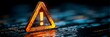 © Strother - Glowing orange warning triangle with exclamation mark on dark blurred computer code background illustrating cybersecurity threat, system error, and data breach alert.