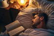 © Florian Dussart - Man sleeping in bed with an open book under warm lamp light