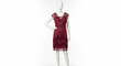 © Federico - A mannequin wearing a red lace dress poses in a studio with its hand on hip.