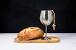 © Tosh Lubek - Communion Bread Loaf with Chalice and Hanging Rosary