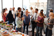 © Rawpixel.com - Casual networking event with refreshments.