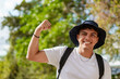 © Jordan - Young man showing bicep during outdoor hiking