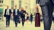 © Mree - Businessman walking with briefcase in city street professional lifestyle concept
