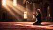 © Lemonkey - Muslim man kneeling in prayer inside a mosque on a red carpet, expressing devotion, faith, and spiritual calm in a sacred Islamic setting.