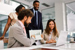 © djile - Business professionals discussing growth during a corporate meeting