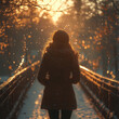 © Barno - Woman walking on snow-covered bridge.