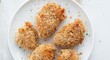 © vxnaghiyev - Quickly cooked breaded chicken using an air fryer for crispiness