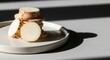 © Karman - Delicate Sliced Root Vegetable Stacked on a Modern Plate