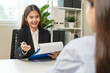 © Pormezz - Manager talking with applicant candidate for career path in job interview.