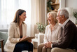 © Meow Creations - Friendly female social worker talking with a happy elderly couple at home