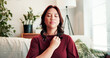 © peopleimages.com - Breathe, holistic therapy and woman on sofa for calm, mindfulness and healing for counseling. Psychology, somatic therapist and person with breathwork for awareness, emotions regulation and energy