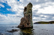 © Alvise - Ruined Stone Tower in Coastal Sea