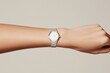 © Katya - Timepiece displayed on wrist in a minimal studio setting showcasing classic design and elegance