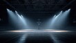 © Prayoga - Empty Basketball Court Illuminated by Dramatic Stage Lights.