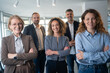© Nenad - Portrait, management and arms crossed with a business team in the office for collaboration. Teamwork, diversity and leadership with a happy employee group together in their professional workplace