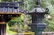 © robertharding - Stone lantern at Mausoleum of Iemitsu in Rinnoji Temple features intricate design and rich history in Nikko Tochigi Japan