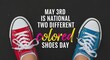 © Moriom - Person wearing red and blue shoes for National Two Different Colored Shoes Day