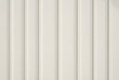 © Meow Creations - Clean minimalist background of off white vertical board and batten wall siding