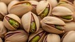 © Cantik - Close-up shot of delicious pistachios in their shells.