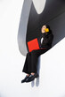 © VISTA by Westend61 - Businesswoman multitasking with phone and laptop outdoors in Barcelona