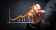 © Nan Shen - Businessman holding percentage graph symbol and up arrow. Concept of interest rate and tax calculation. Investment growth and profit. Dividend and long term investment to beat inflation