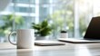 © Kholid - Cozy workspace featuring coffee cup, laptop and notepad on wooden surface