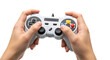 © Kawaiii_Biee - Hands holding a video game controller, ready to play a game.