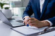 © Father_Studio - Business contract document stamping with approval seal, agreement verification, official paperwork process, legal compliance and corporate documentation concept.