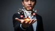 © Jignesh - Man in business suit holds hand out with shopping cart and social media icons floating above