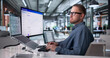 © Andrey Popov - Manager Diligently Monitors Safe Digital Bank Transfers