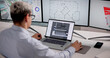 © Andrey Popov - Architect Analyzes 3D BIM Model To Enhance Building Design