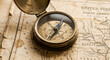 © Gowrob - Vintage Brass Compass Resting on an Antique Map of North America