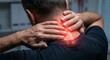 © Olga Ко - Close up of a man suffering from severe neck pain. Unrecognizable person holding aching cervical spine with red glowing highlight indicating muscle spasm and inflammation