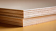 © A2Z AI  - Close-up of stacked wooden sheets showcase the intricate layered texture and natural grain of the material on a warm background, perfect for design