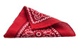 © Maria - Isolated folded red cotton bandana with classic white and black paisley pattern and textile detail