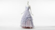 © instantnoodledude6 - A mannequin wearing a lavender evening gown on display indoors on white background