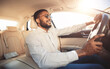 © Prostock-studio - African american man driving car, going to work place, free space