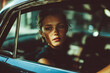 © demzp - Young woman with freckles looking out car window with sunlight on her face
